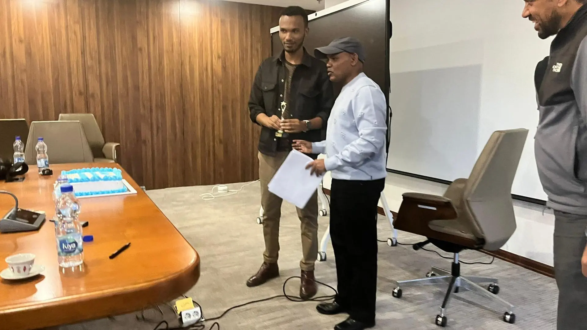 Receiving Trophy from CEO